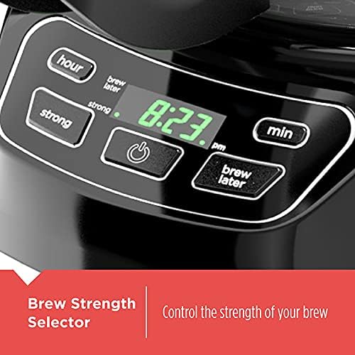 Digital display on a coffee maker with brew strength selector buttons.