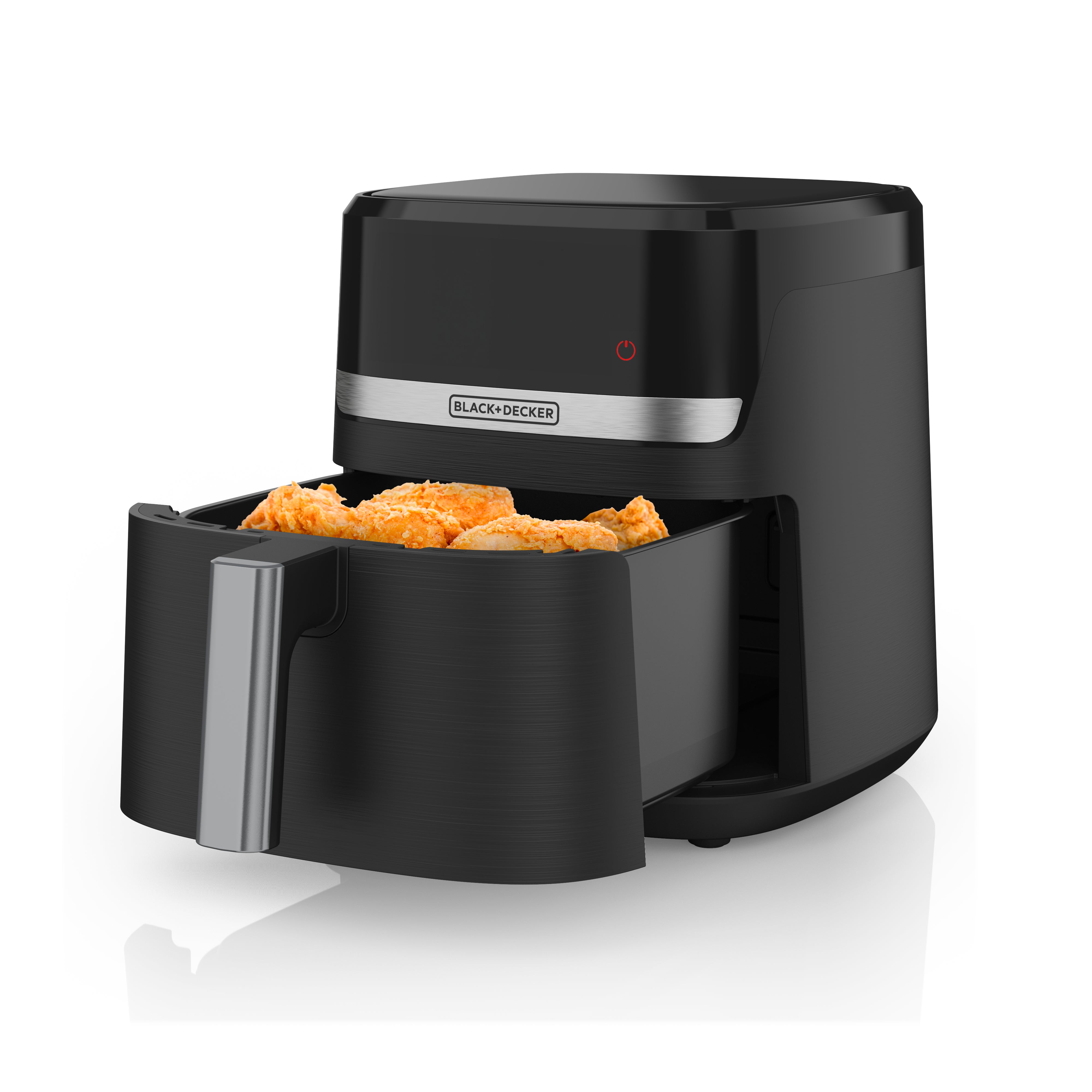 Black+Decker air fryer with food inside on a white background