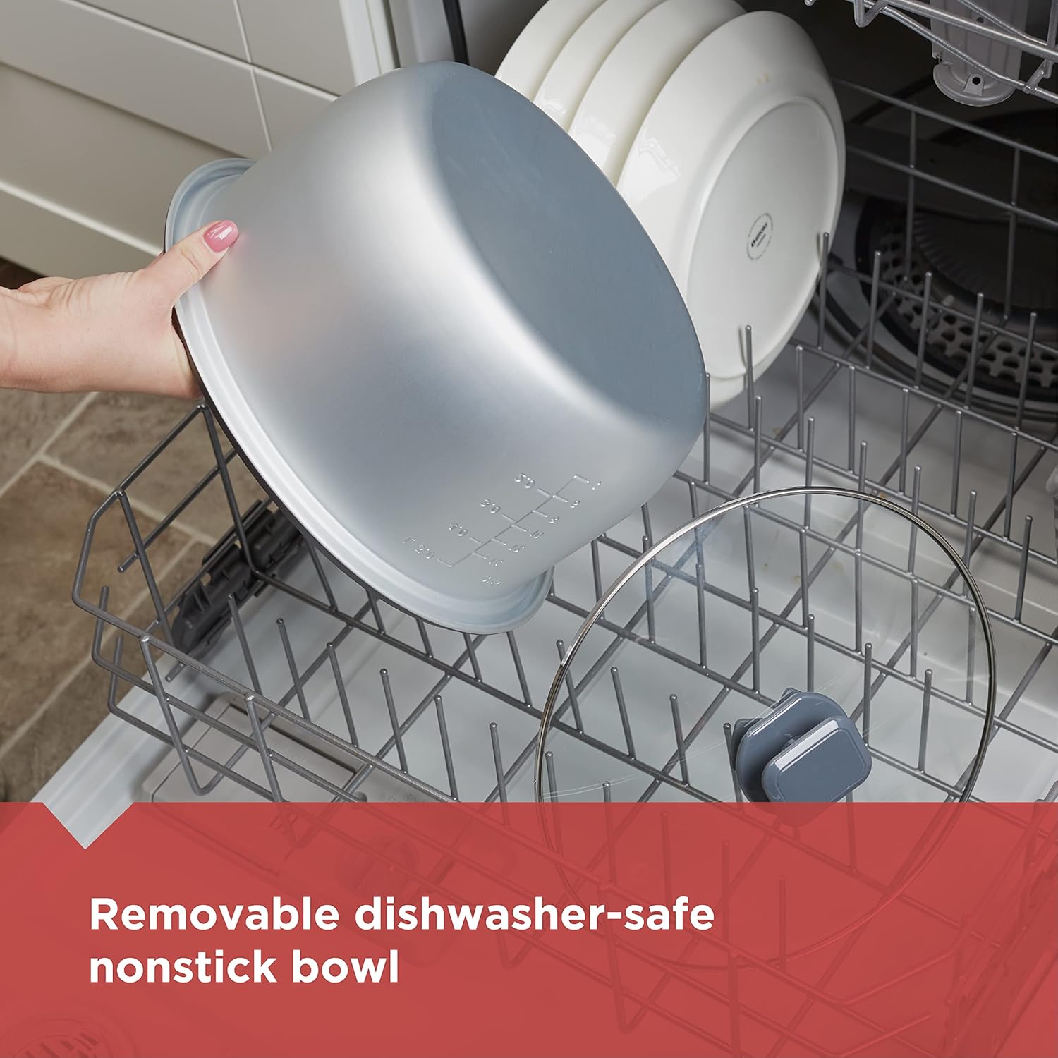 Person placing a nonstick bowl into an open dishwasher with text 'Removable dishwasher-safe nonstick bowl'.