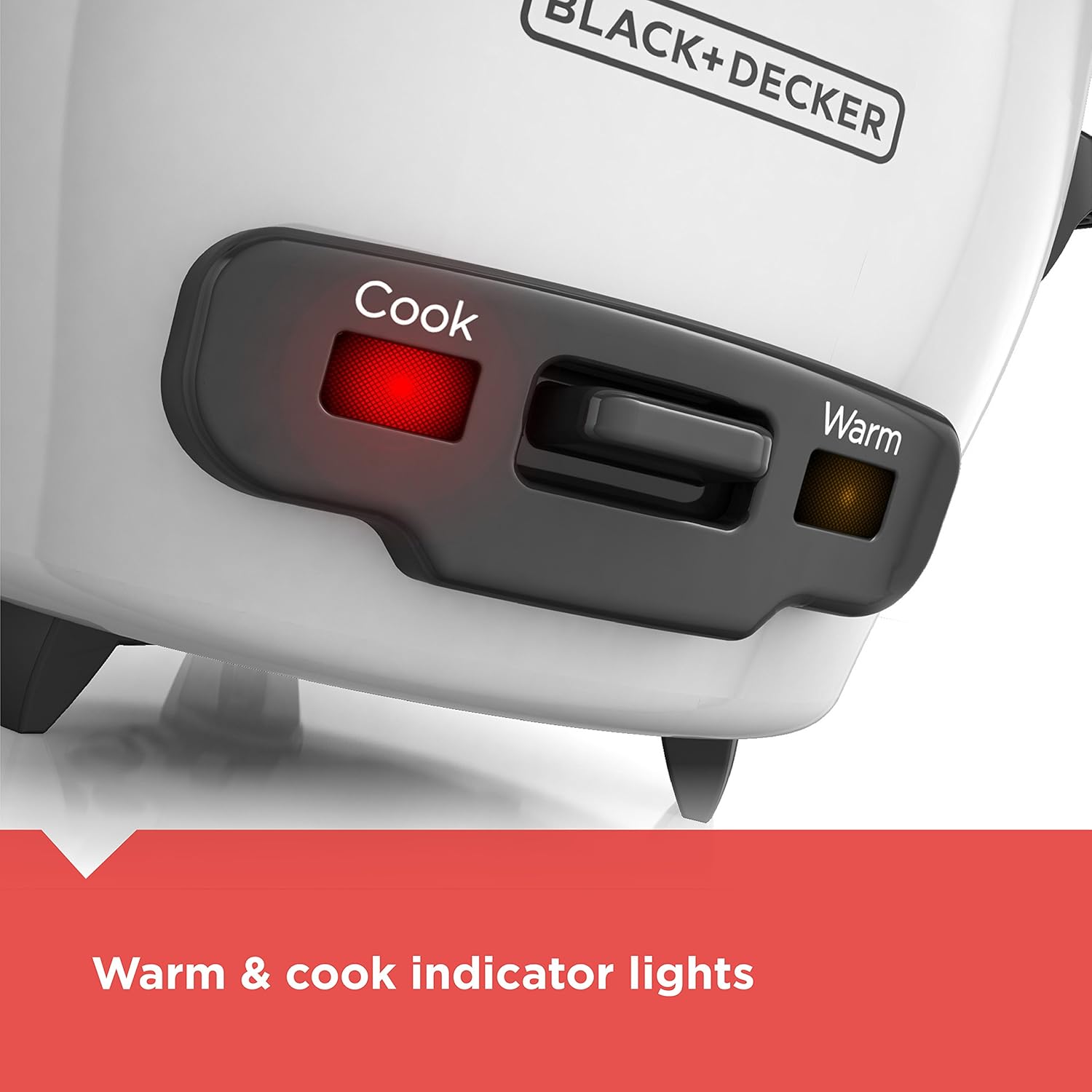Black+Decker rice cooker with 'Cook' and 'Warm' indicator lights on a white background
