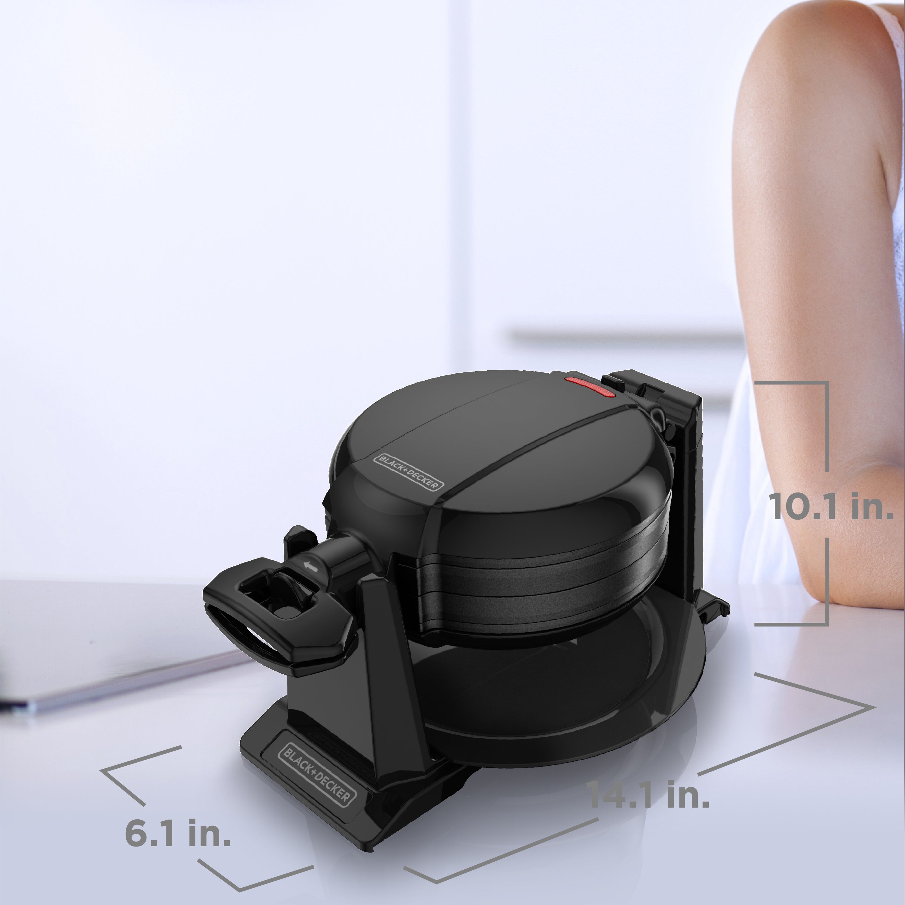 Black waffle maker with dimensions indicated on a white background