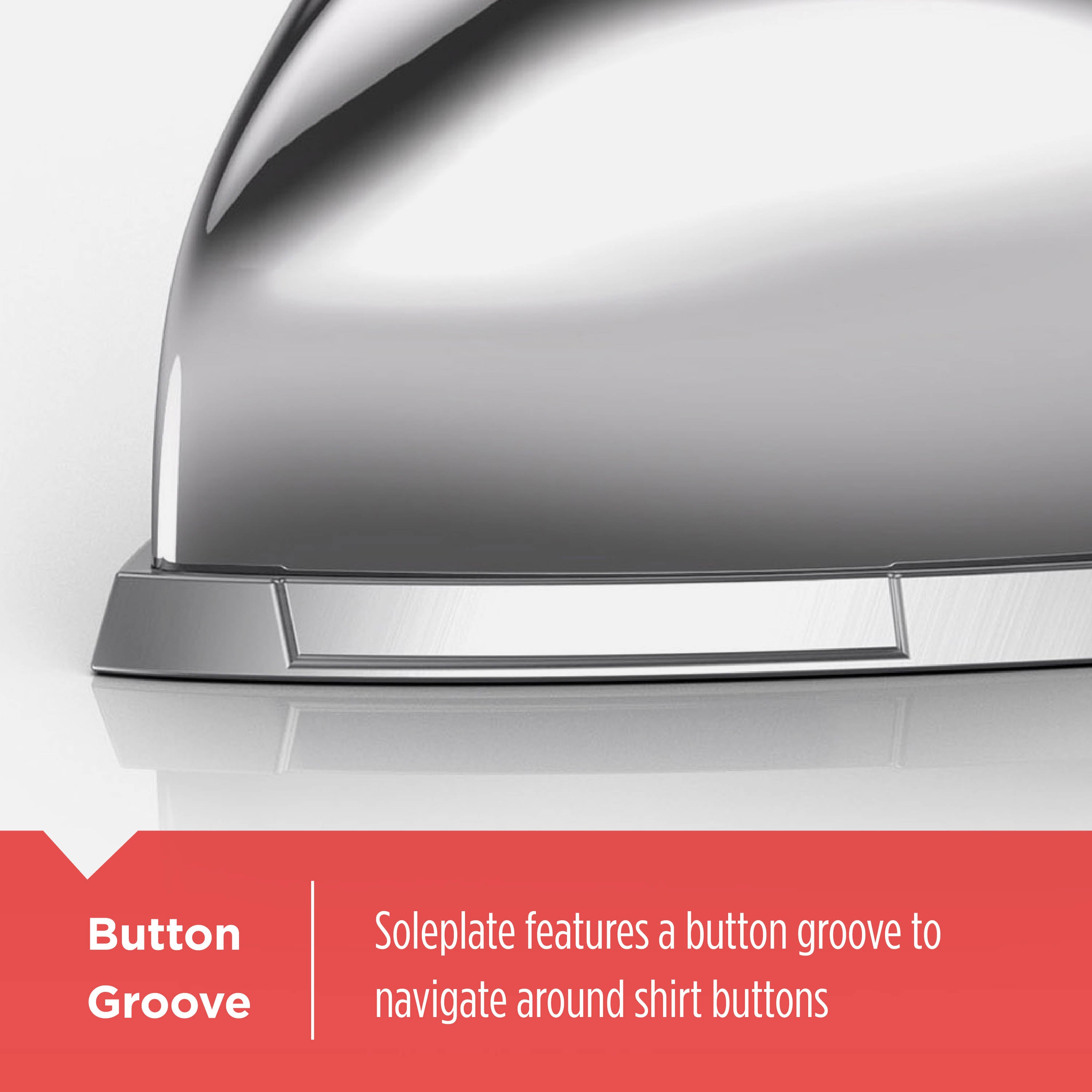 Close-up of a metallic soleplate with a button groove feature on a white background.