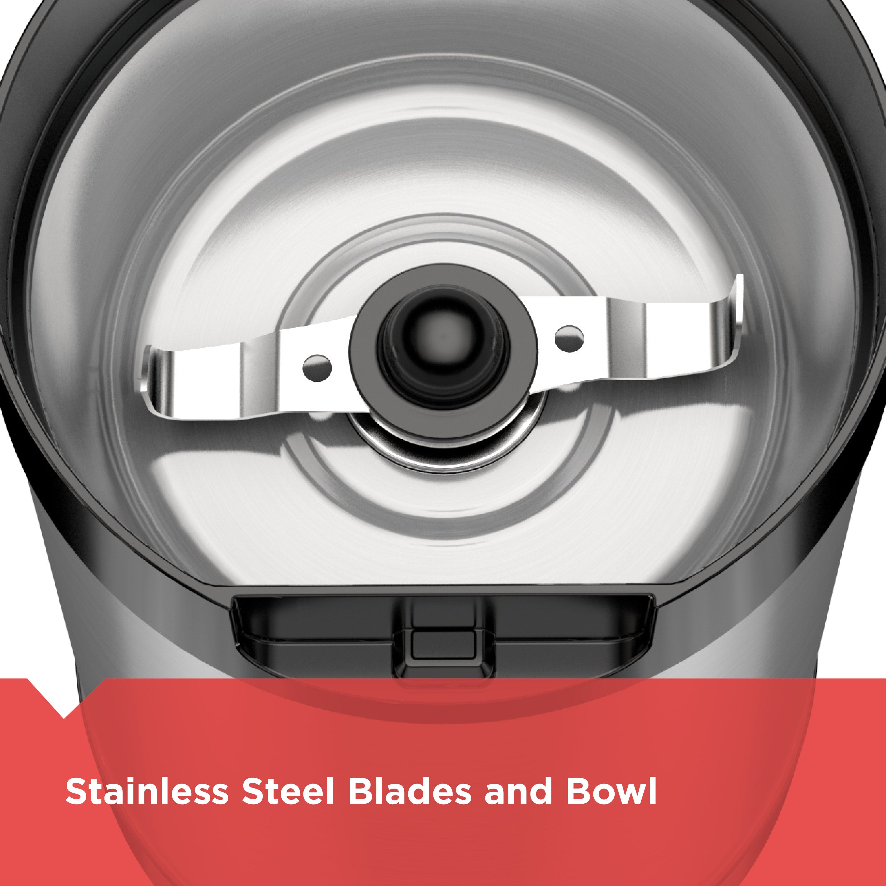 Close-up of a kitchen appliance with stainless steel blades and bowl, on a white background.