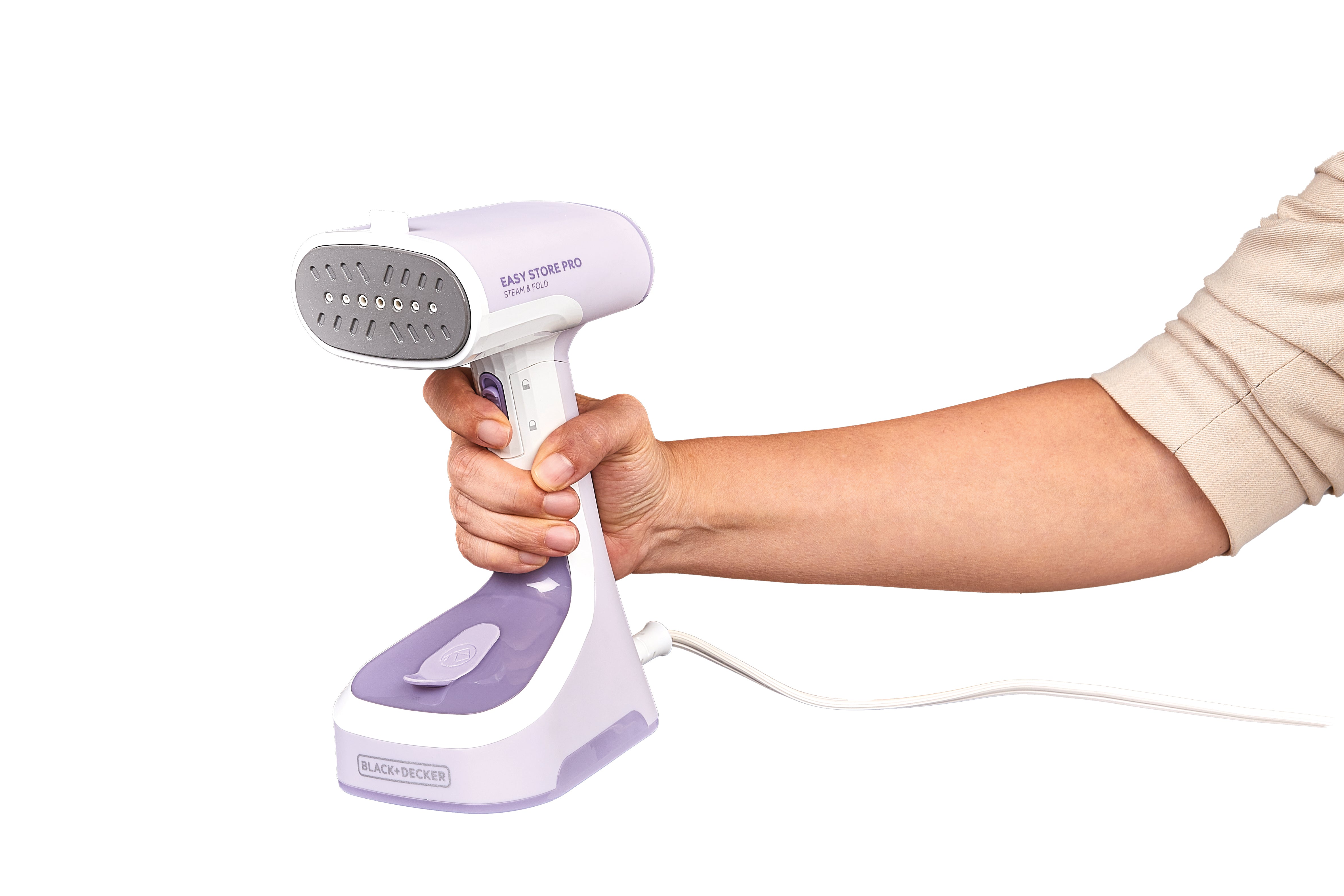 Hand holding a purple and white handheld steamer on a white background
