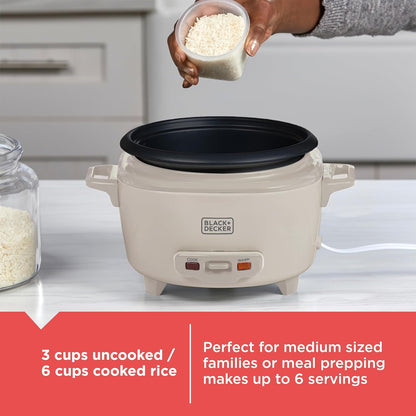 Black+Decker rice cooker with a hand adding rice, kitchen setting