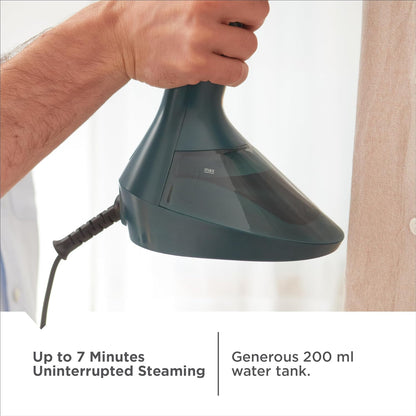 Hand holding a green handheld steamer with text about steam time and water tank capacity.