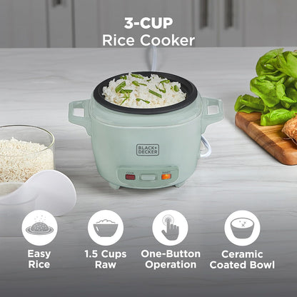 3-Cup rice cooker with cooked rice and green vegetables on a kitchen counter.