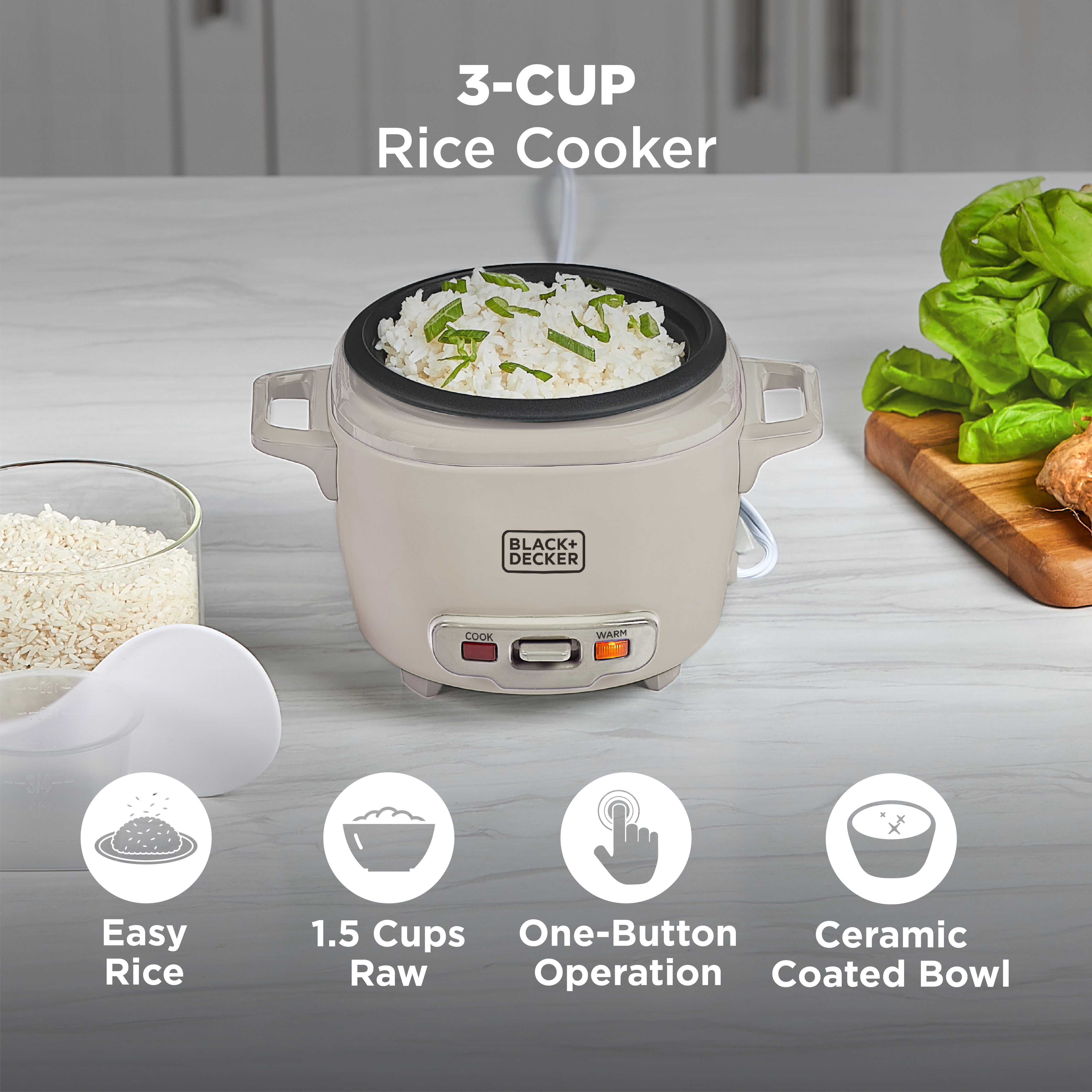Black+Decker 3-cup rice cooker with cooked rice and green onions on a kitchen counter.