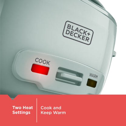Black+Decker rice cooker with 'Cook' and 'Warm' buttons on a gray background