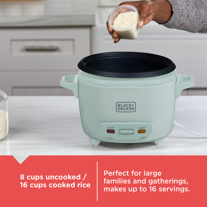 Green rice cooker with a hand adding rice, kitchen setting