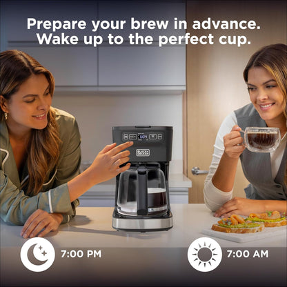 Two women using a Black & Decker coffee maker with text indicating preparation ahead of time.