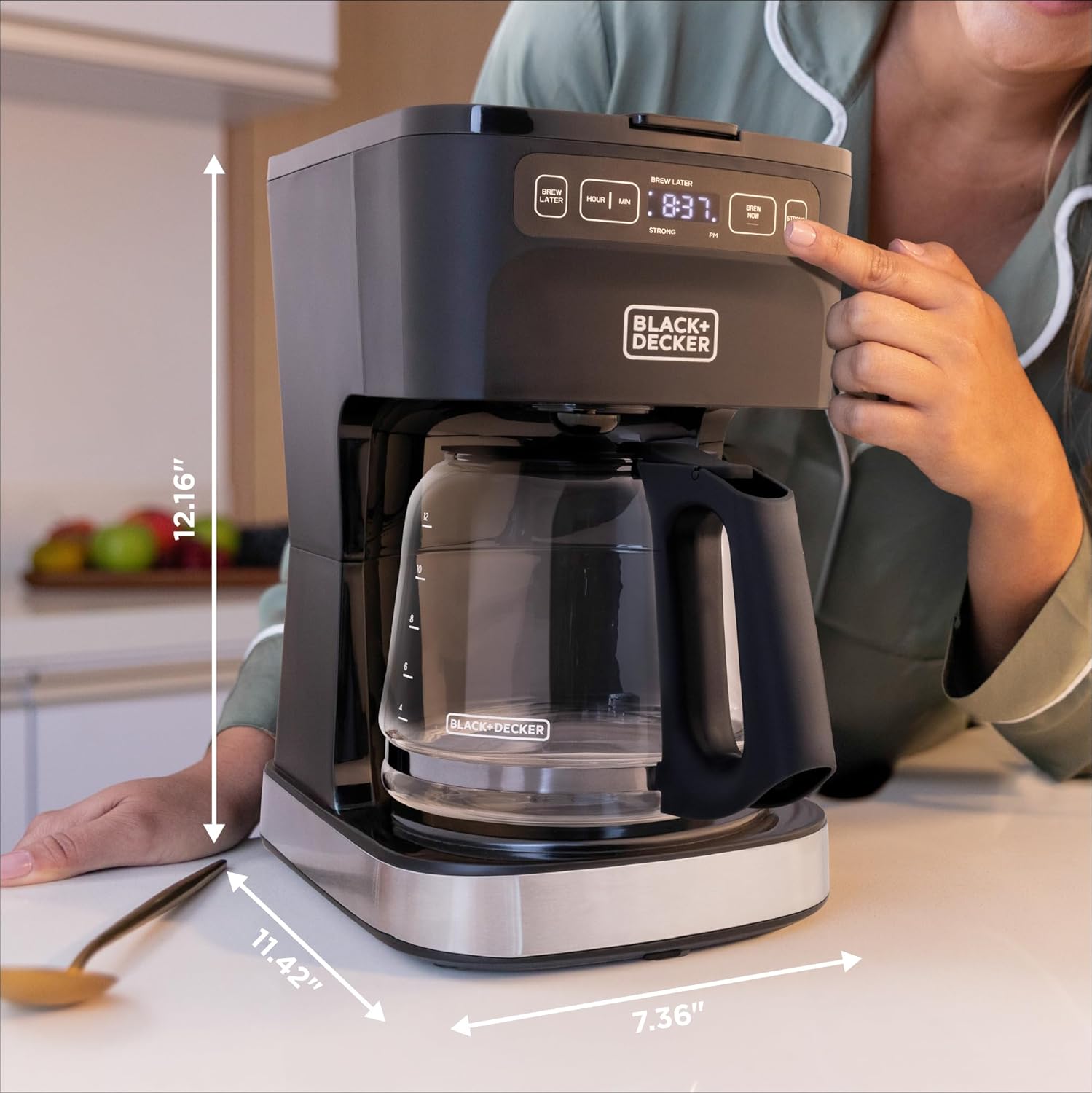 Black+Decker coffee maker with dimensions labeled on a kitchen counter