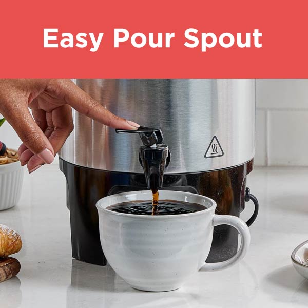 Hand using pour spot on coffee filling mug