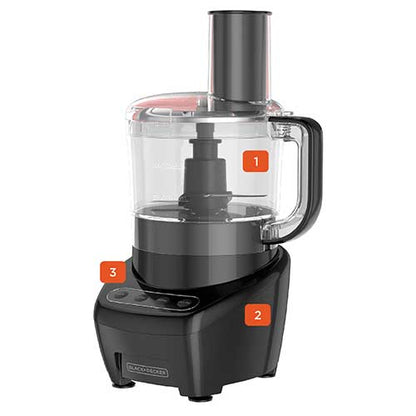 Black food processor with clear container on a white background