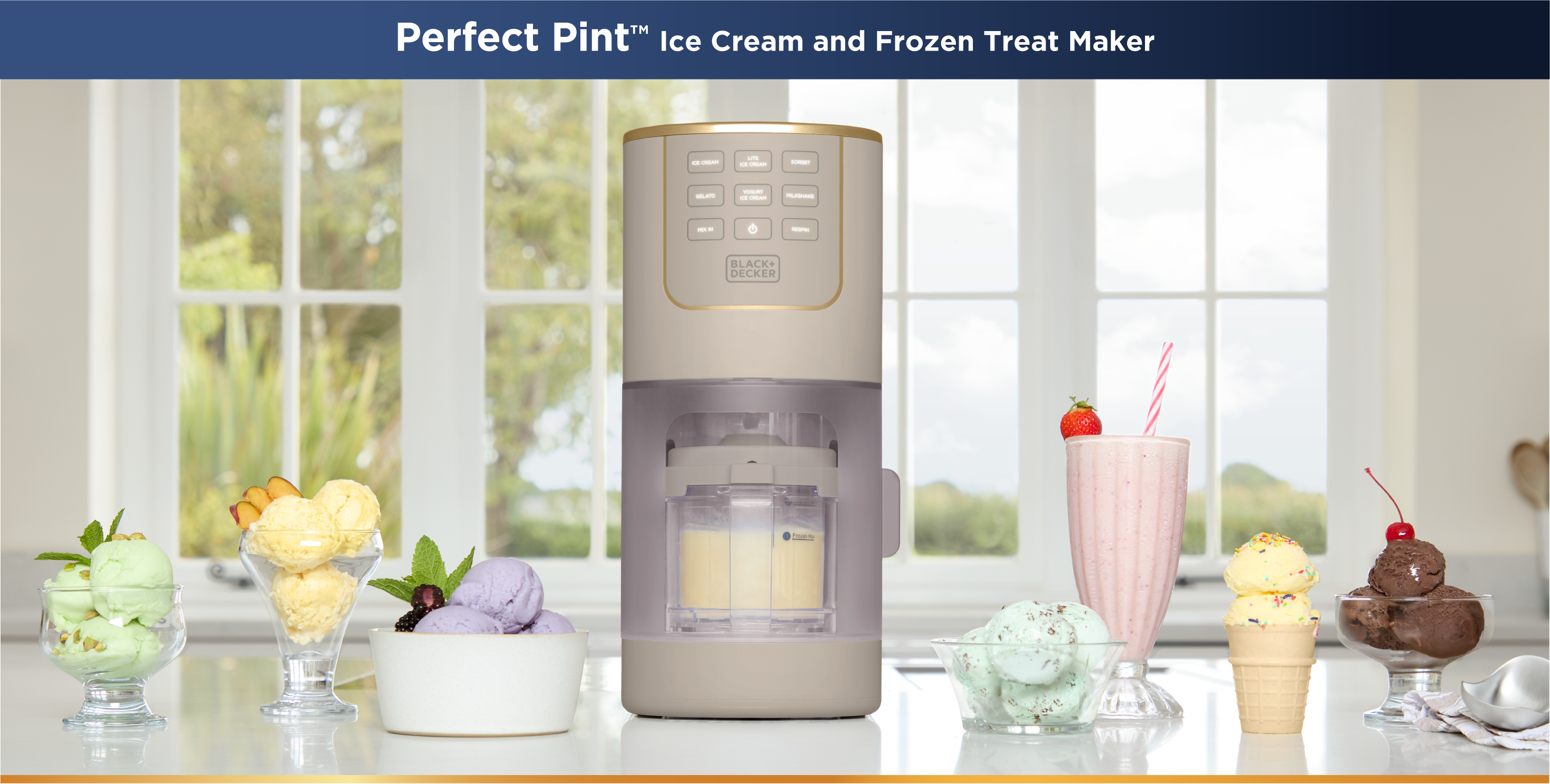 Perfect Pint ice cream and frozen treat maker on a kitchen counter with various treats displayed.