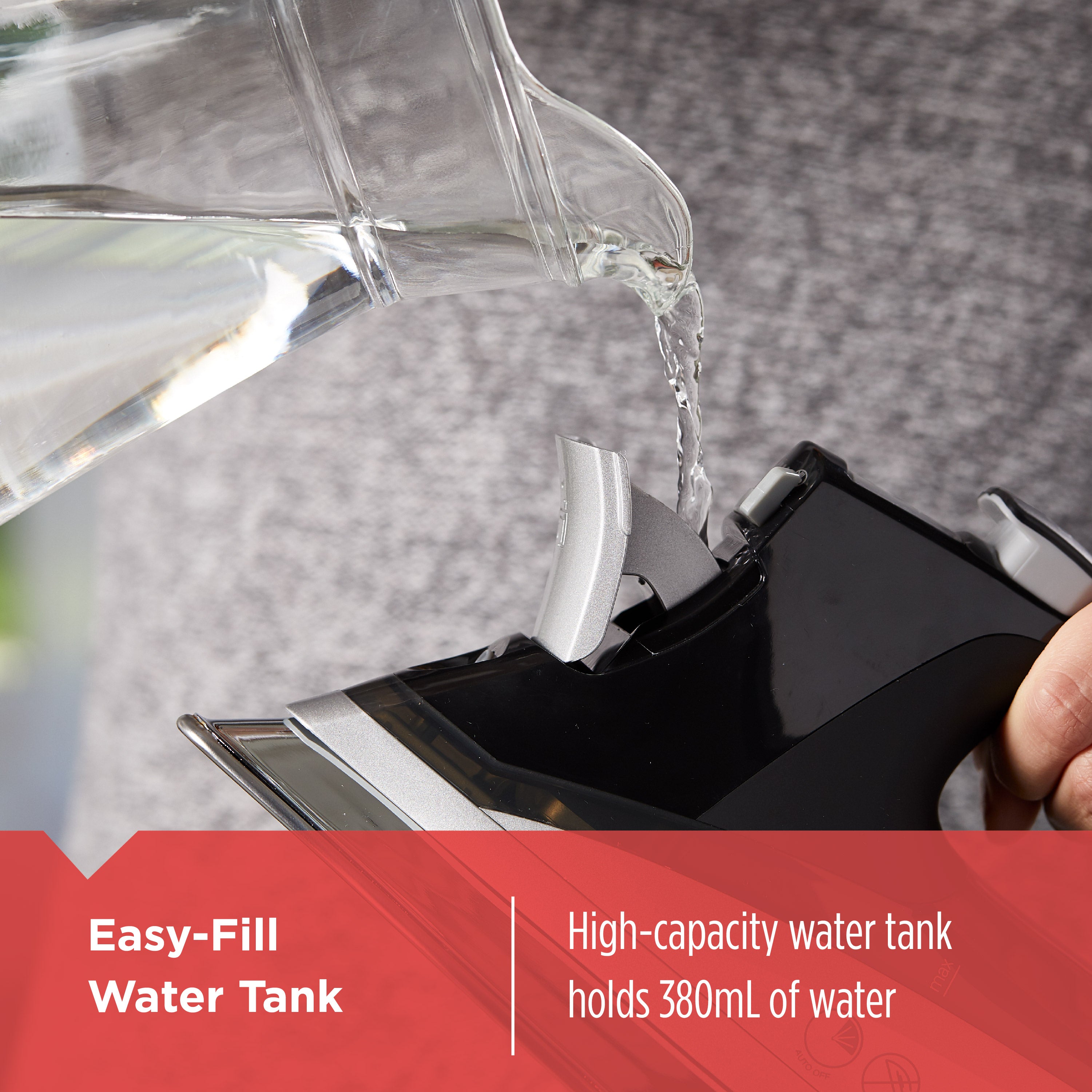 Person pouring water from a clear pitcher into a black water tank with text about the easy-fill water tank capacity.