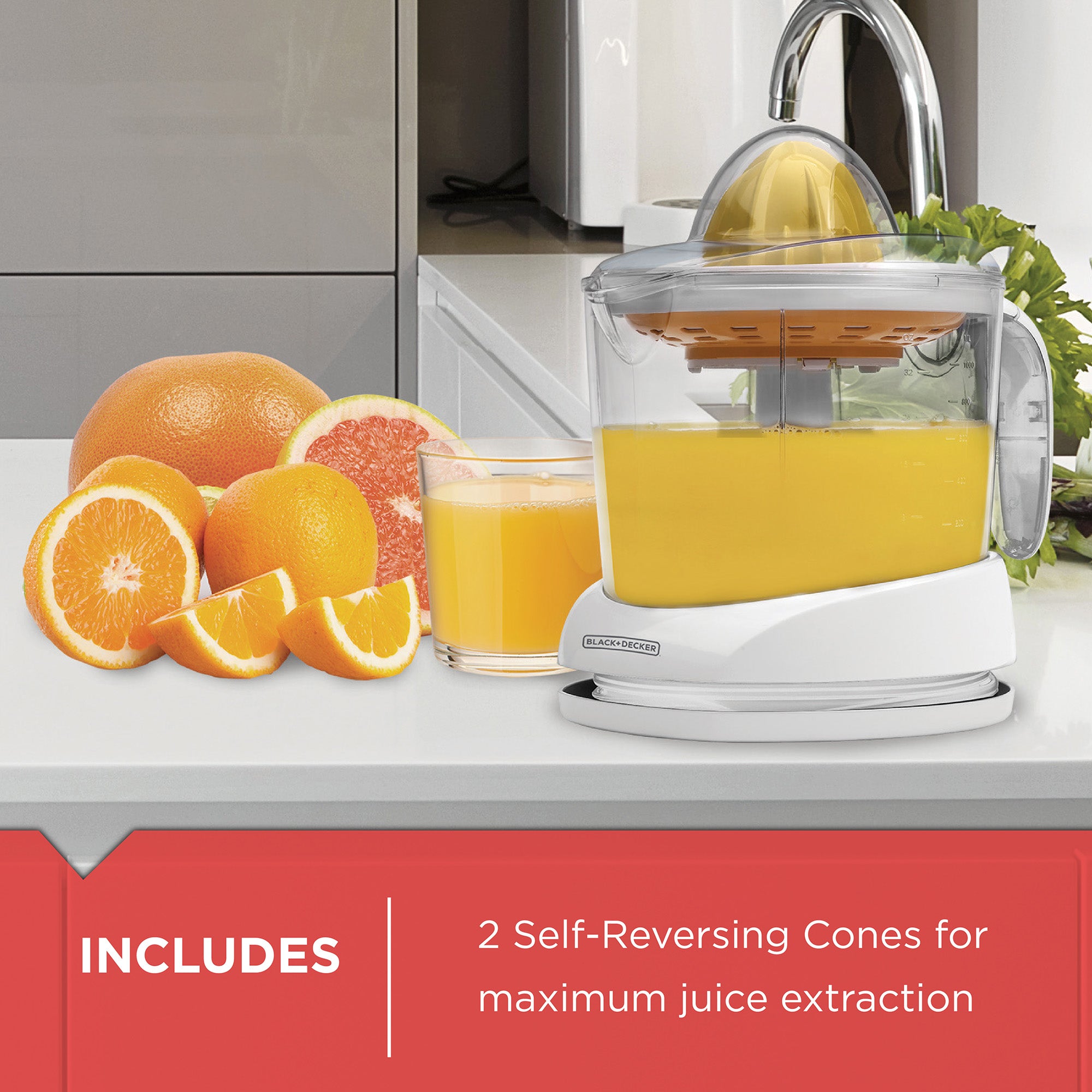 Juicer with oranges and juice on a kitchen counter, featuring text about self-reversing cones.