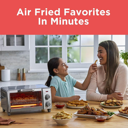 Woman and child in a kitchen with an air fryer, plates of food, and the text 'Air Fried Favorites In Minutes'.