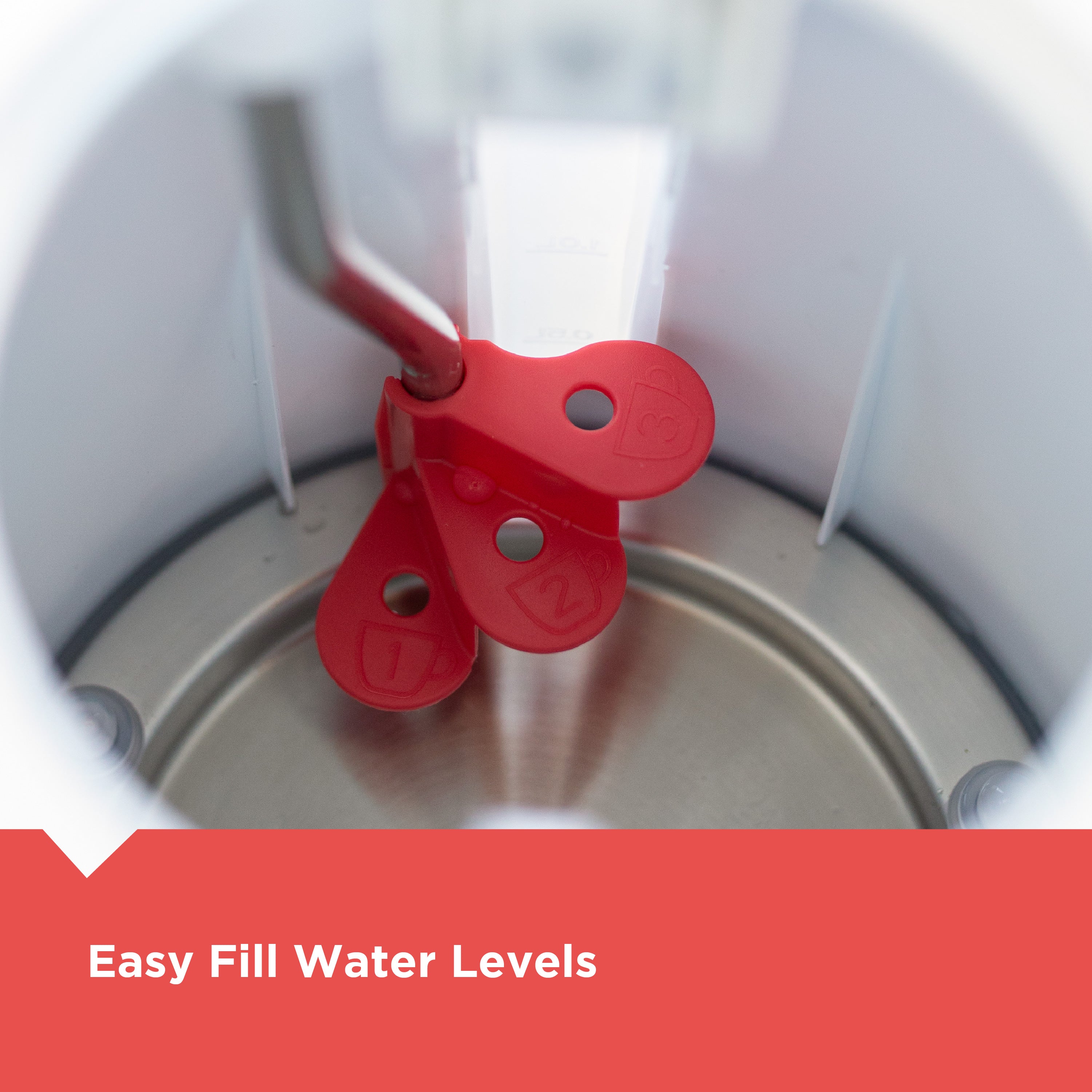 Red water level indicator on a metal container with 'Easy Fill Water Levels' text.
