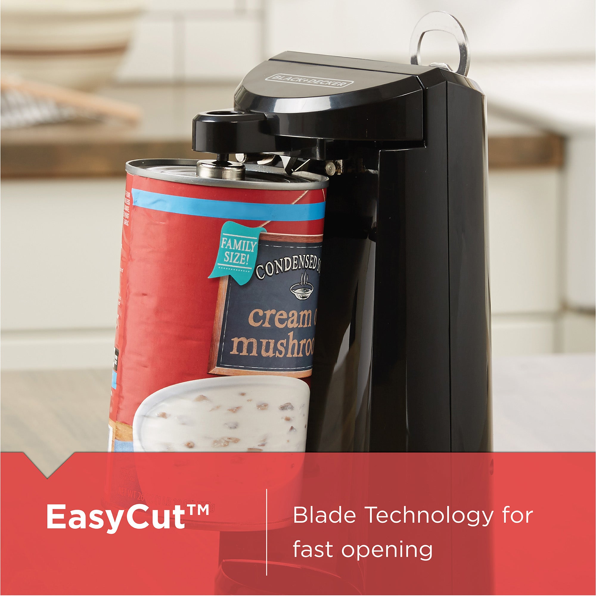 Can opener with a can of cream mushroom on a kitchen counter, featuring 'EasyCut' blade technology.