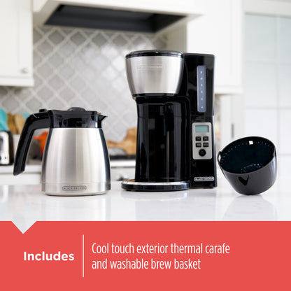 Black and Decker coffee maker with thermal carafe and brew basket on a kitchen counter.
